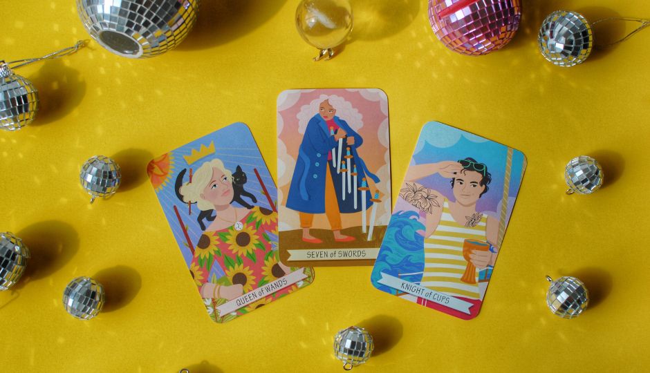 Illustration of three tarot cards: Queen of Wands, Seven of Swords, and Knight of Cups, surrounded by disco balls.