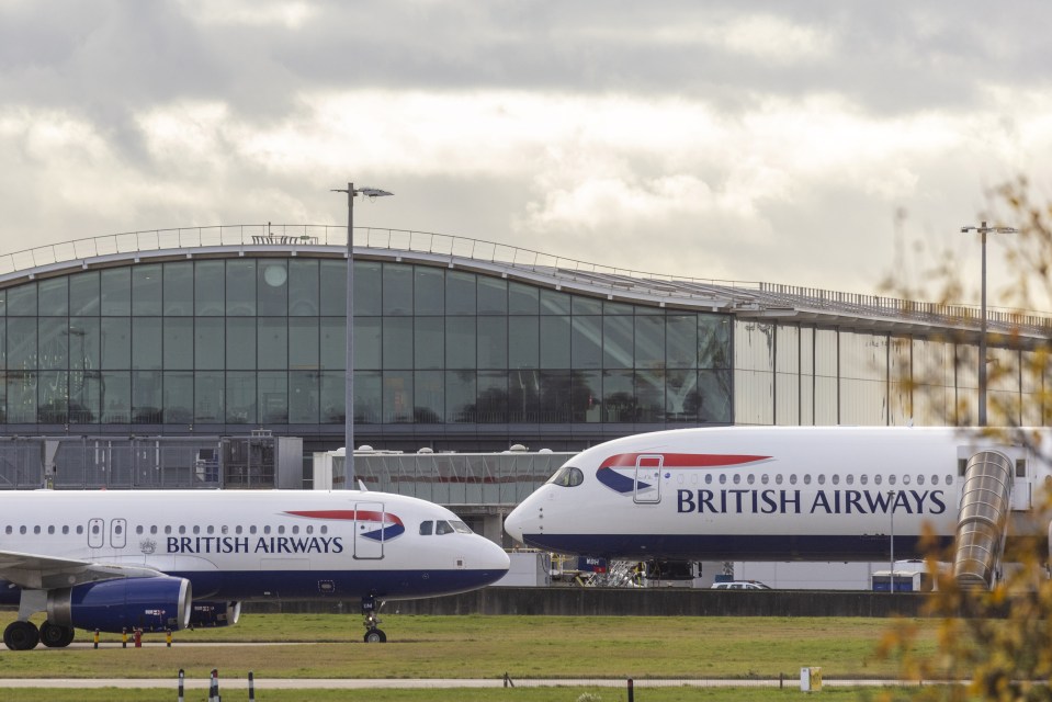 Two British Airways planes at Heathrow Airport.