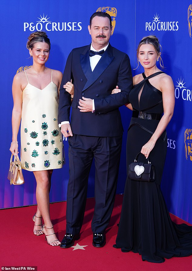 He finished by addressing his two daughters Dani, 28, and Sunnie, 18, (seen) who were sat in the audience and took the opportunity to swear one last time to laughter from the audience