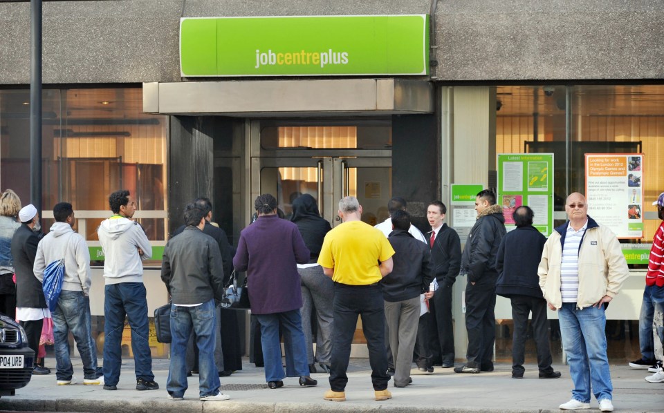 People queueing outside a Job Centre Plus.