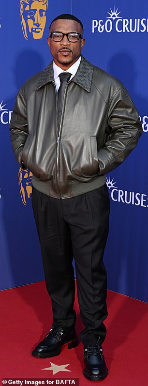 Ashley, 42, looked as handsome as ever as he arrived at the star-studded event in a relaxed-fitted leather jacket, which he paired with black tailored trousers