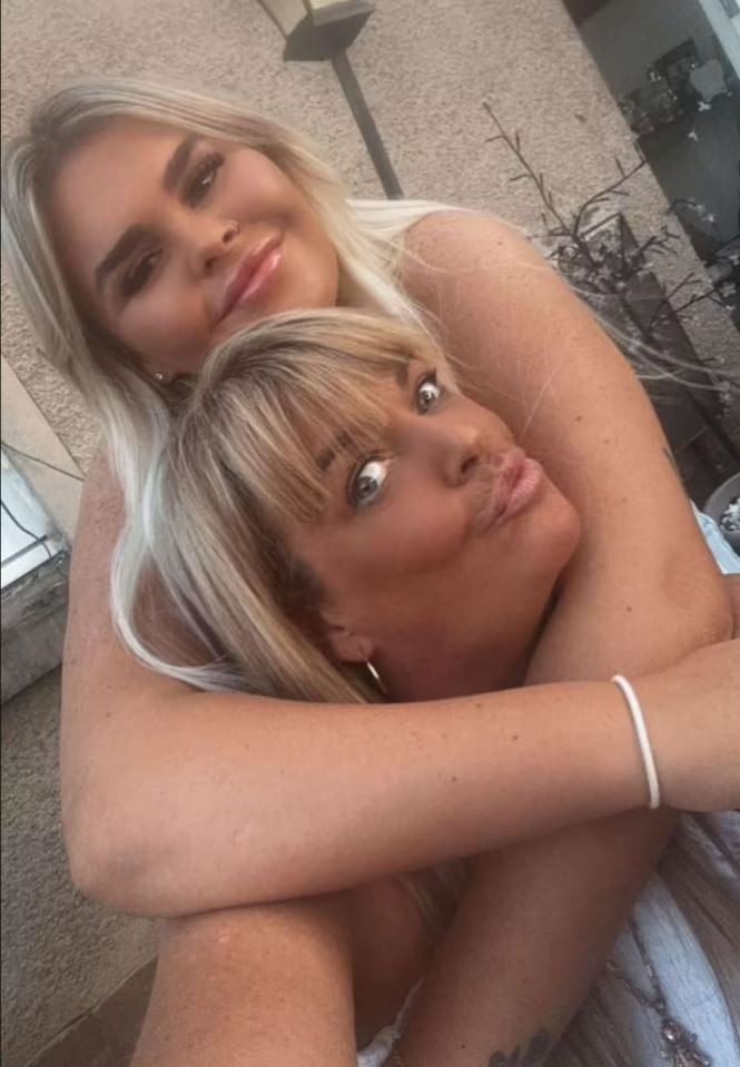 Two women embracing.