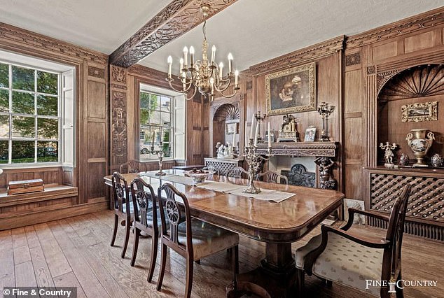 Chic: The panelling in the property's dining room was created 18 years ago