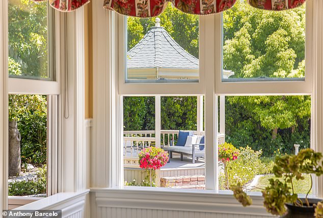 Covered patio space connected to the detached carriage house