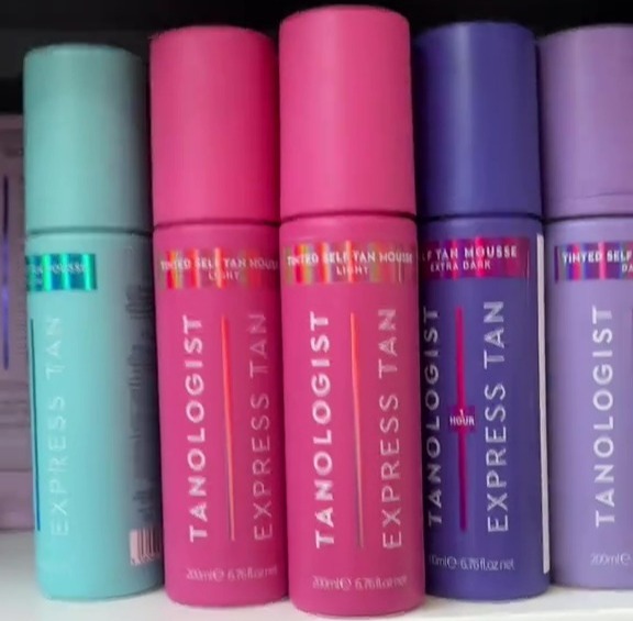 Tanologist Express Tan bottles on a supermarket shelf, on sale for £3.20.