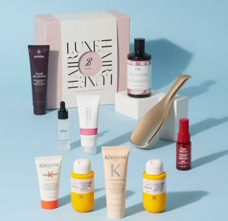 Hair care product box with various hair care items.