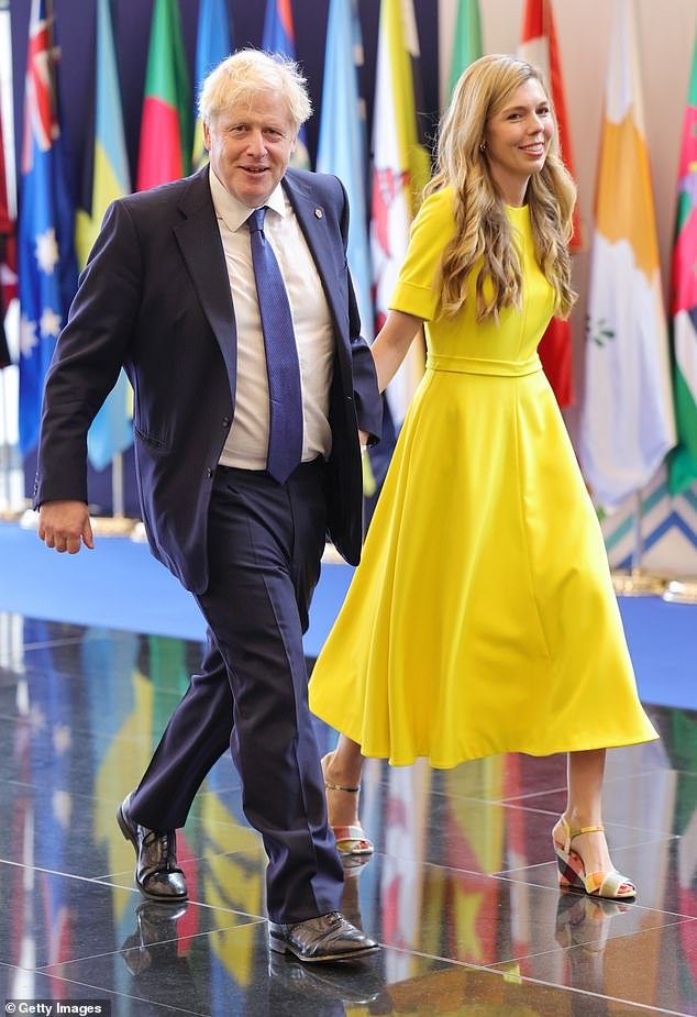 Some of Boris Johnson's allies have started talking up his chances of a comeback. Mr Johnson is pictured with his wife Carrie in 2022
