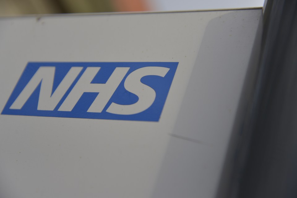 NHS logo on a white surface.