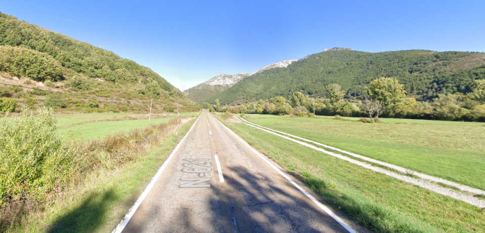 Road N-621 through green valley.