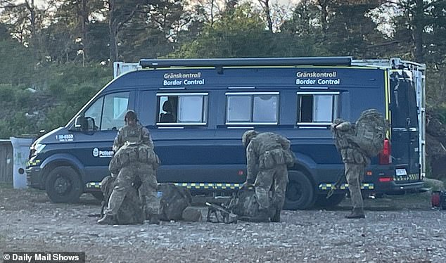 Troops pictured at a Border Control van to check passports during Swift Response 25 drills