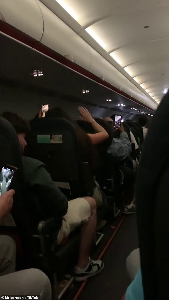 Rowdy passengers bang on seats and chant on the flight to Ibiza