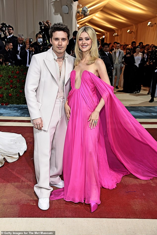 Brooklyn Beckham and his wife Nicola Peltz pulled out of attending the Met Gala to attend his father David's 50th birthday bash, it's been claimed (pictured at the gala in 2022)