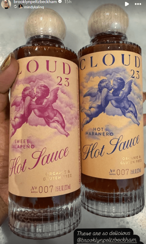 Two bottles of Cloud 23 hot sauce; one sweet jalapeño, one hot habanero.