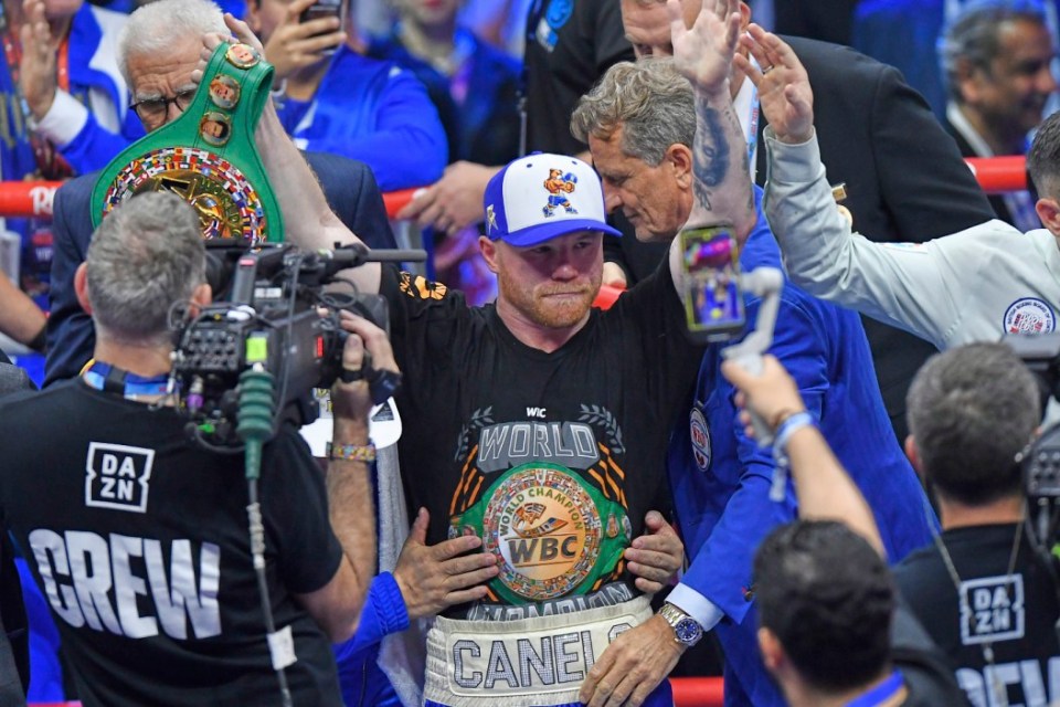 Canelo Alvarez, center, celebrates after wining against William Scull during super middleweight World Boxing Championship at ANB Arena in Riyadh, Saudi Arabia, Sunday, May 4, 2025. (AP Photo)