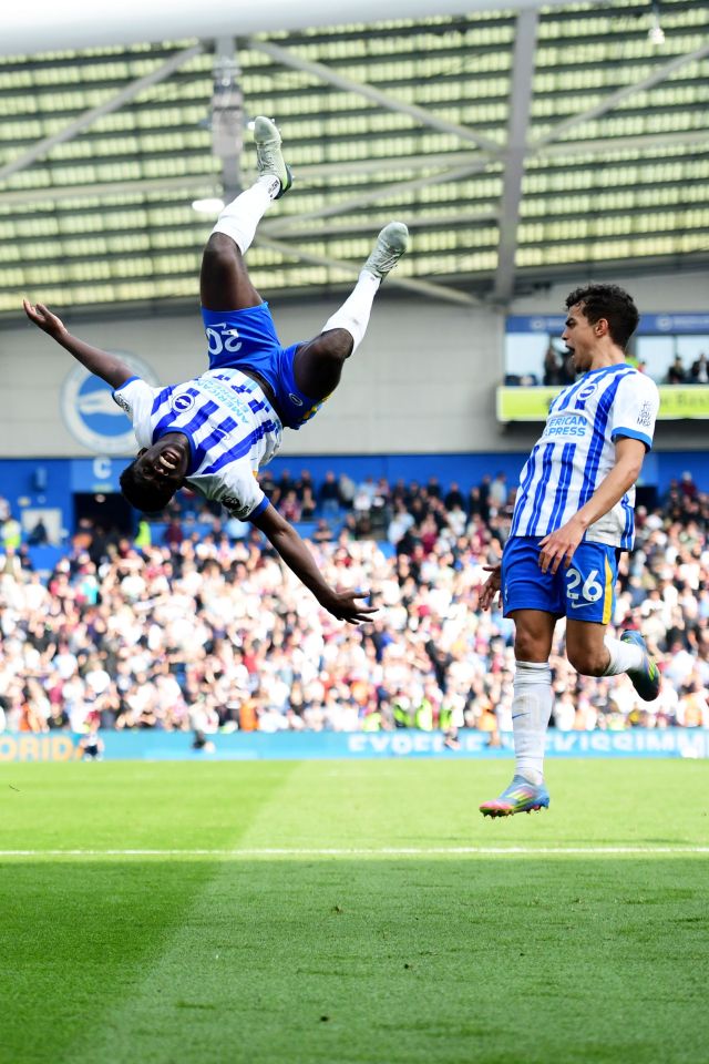 Carlos Baleba of Brighton celebrates a goal with a backflip.