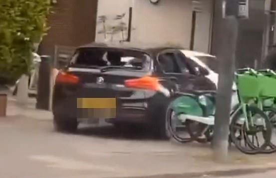A car that appeared to have no rear window was spotted during the incident yesterday
