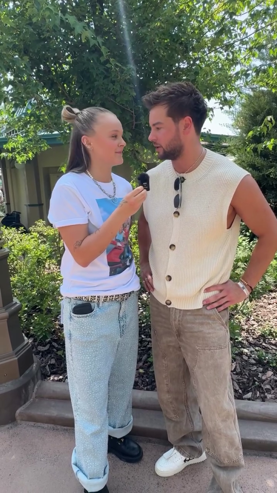 JoJo Siwa and Chris Hughes in an interview.