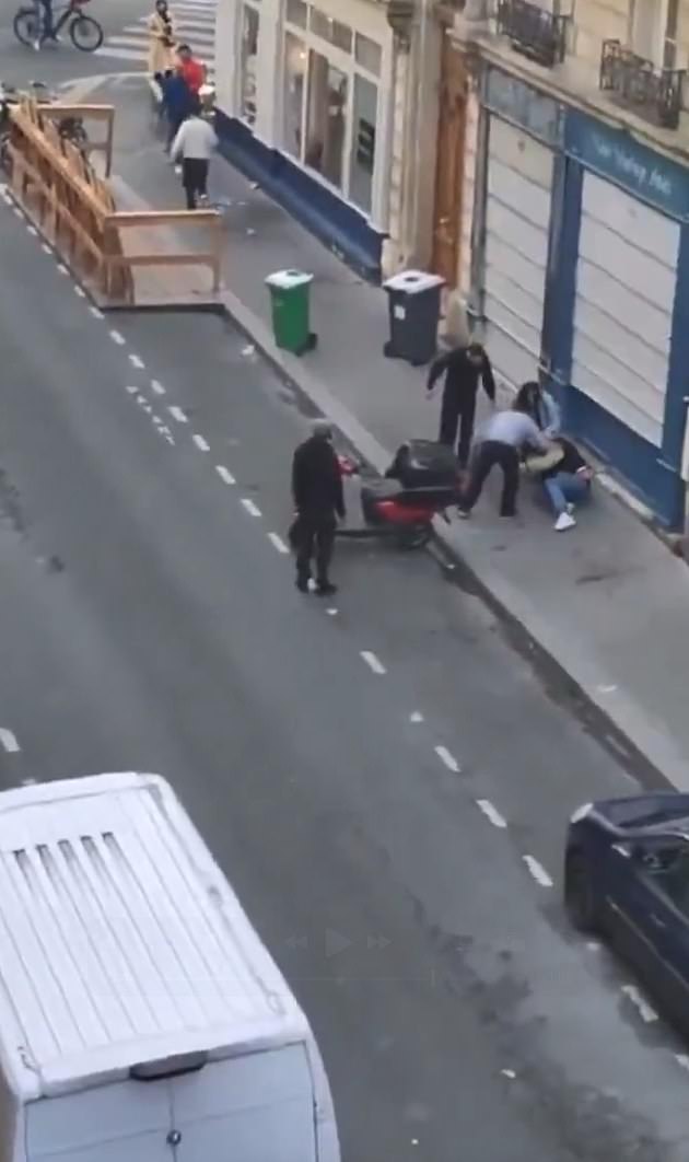 The 34-year-old was walking down Rue Pache in the capital yesterday morning when three armed men approached her