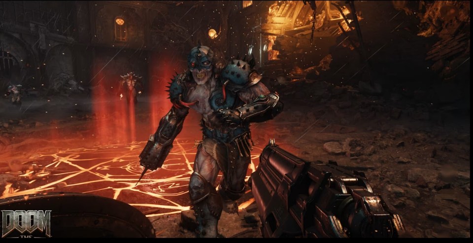 Gameplay screenshot of Doom Eternal showing a demon and a player's weapon.