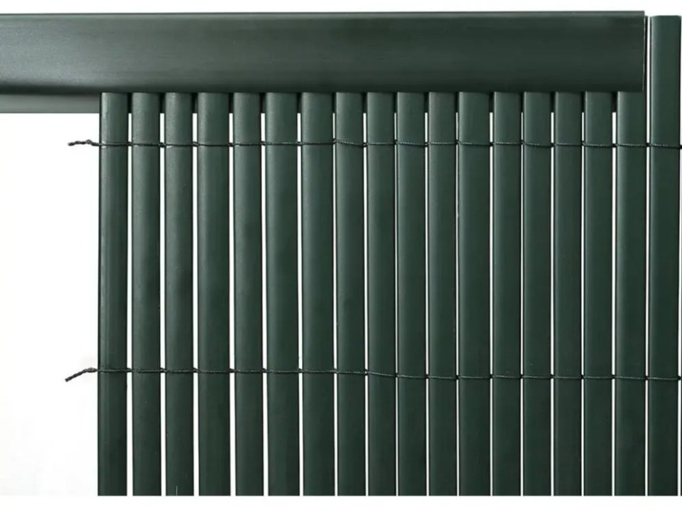 Dark green plastic fence screen.