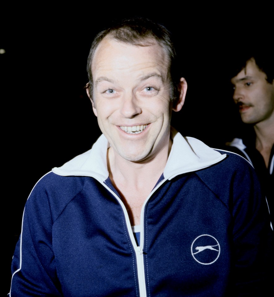 Portrait of Julian Holloway smiling.