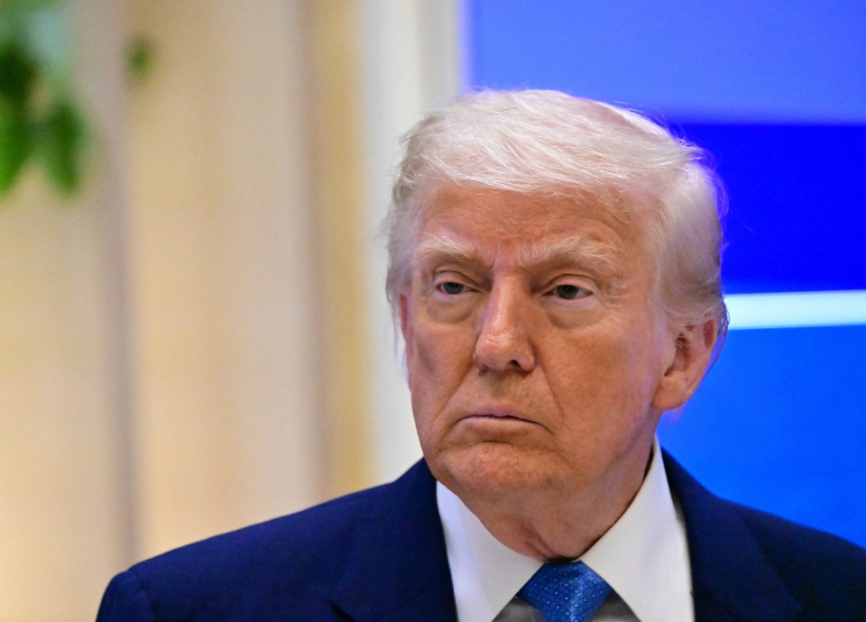 Close-up of Donald Trump at a business forum.