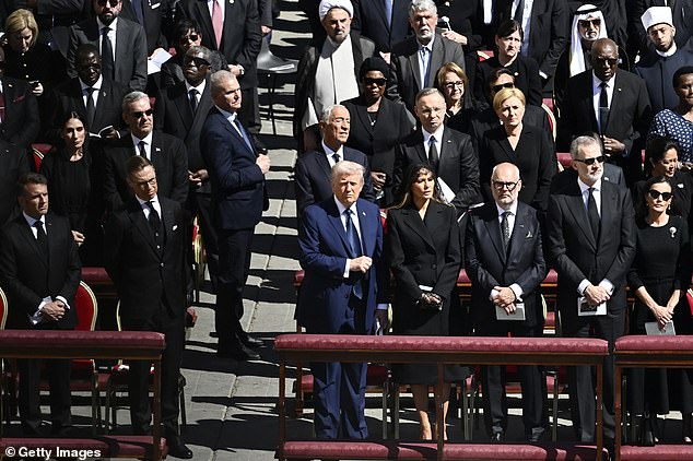 The strict dress code for the event at the Vatican dictated that men should wear a dark suit with a long black tie and white shirt. Shoes, long socks, coats and umbrellas also had to be black