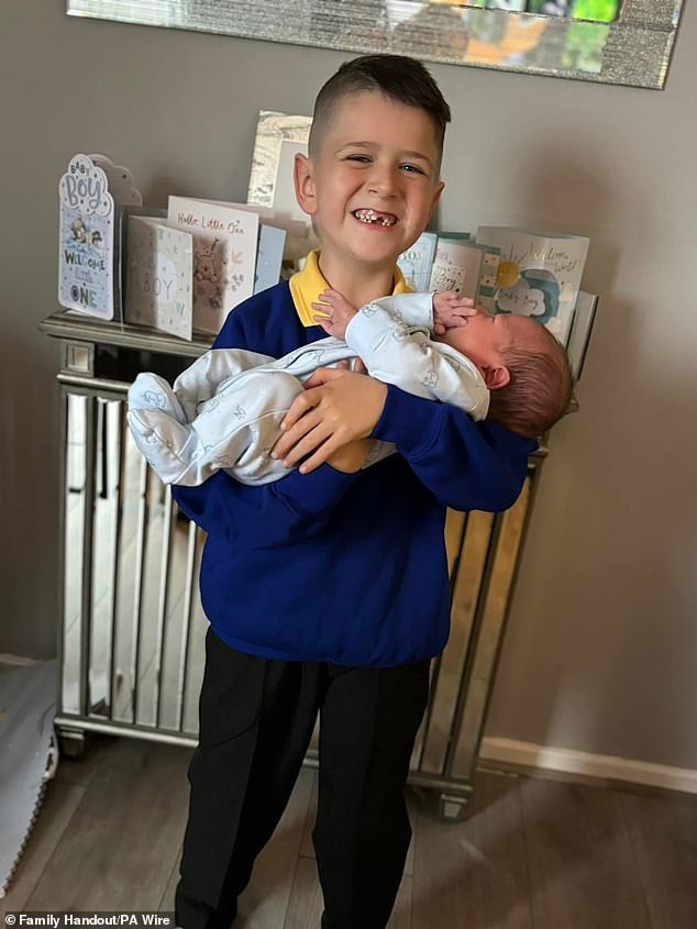 Archie York, seven, was asleep when the blast ripped through the home. He was pulled out of the rubble by his father who also found his baby brother Finley (pictured together) unharmed