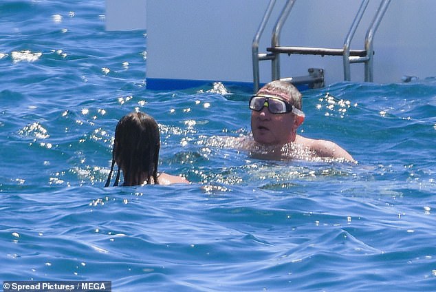 Once they were both in the ocean, the pair enjoyed a brief swim