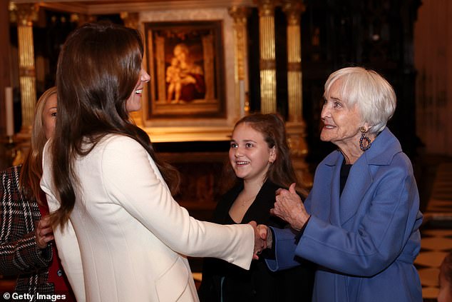 The Princess of Wales speaks with Dame Sheila Hancock at The 'Together At Christmas' Carol Service at Westminster Abbey in London on December 8, 2023