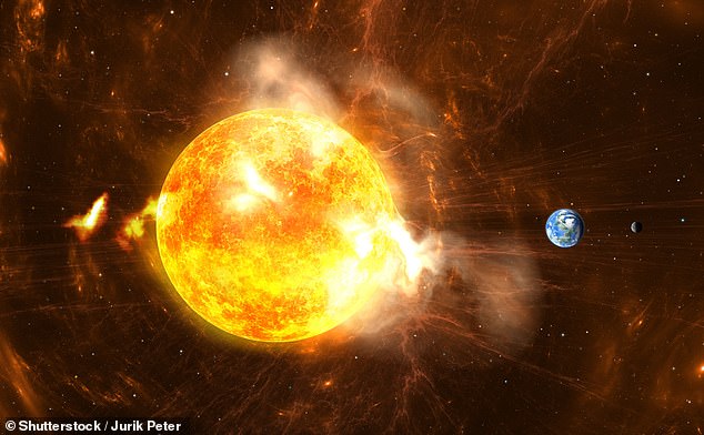 Astronomers now warn that the enormous filament eruption could strike Earth with a glancing blow tomorrow (artist's impression)