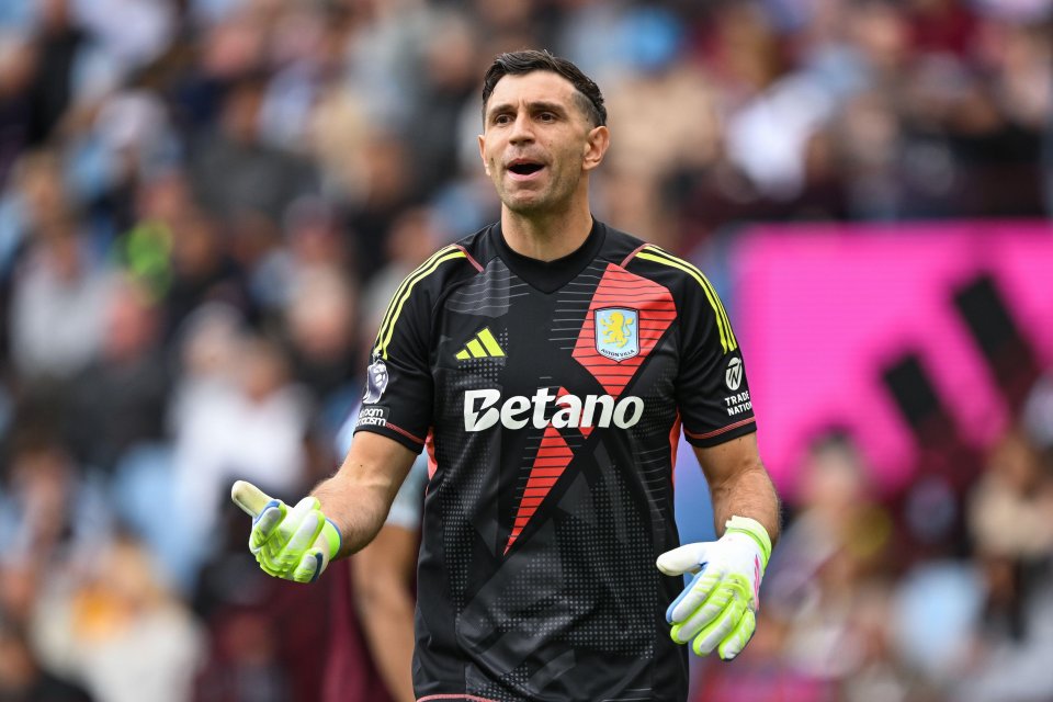 Emiliano Martinez of Aston Villa instructing his team during a Premier League match.