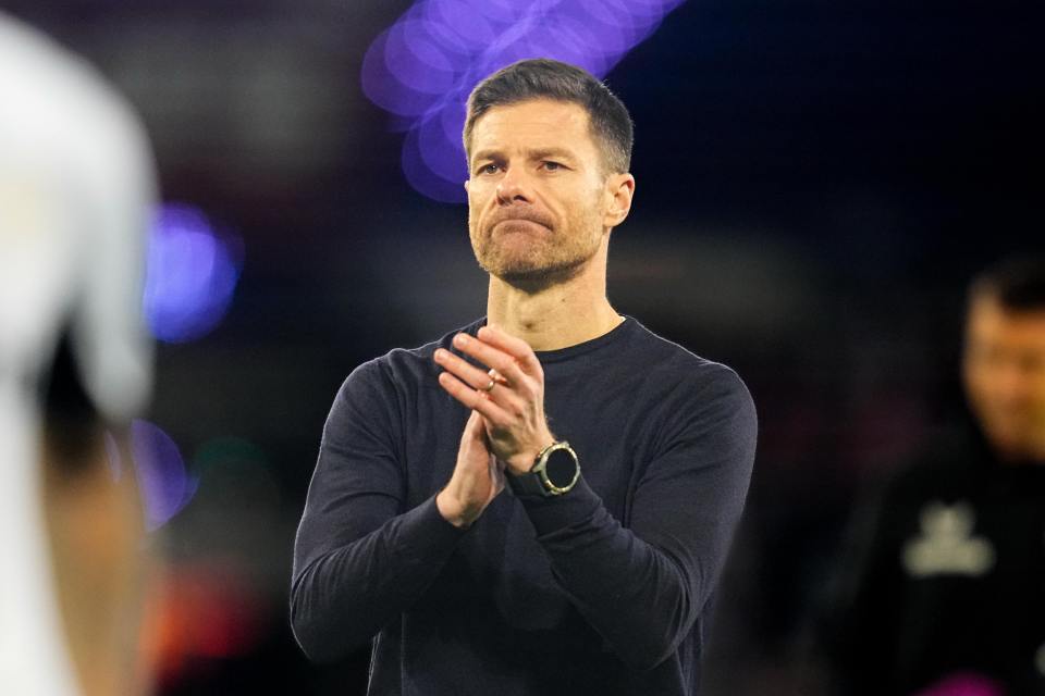 Xabi Alonso of Bayer 04 Leverkusen clapping.