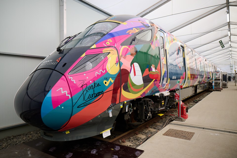 Avanti West Coast train with colorful artwork.