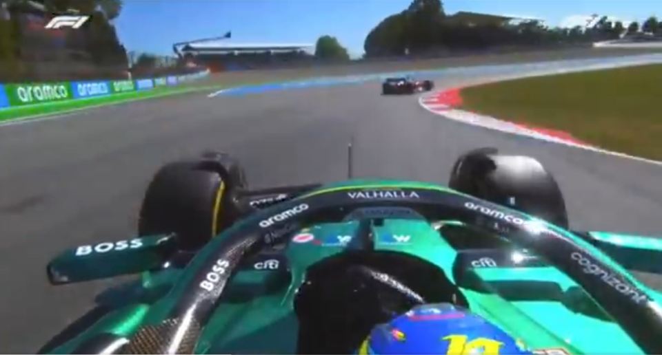 Fernando Alonso driving a Formula 1 car.