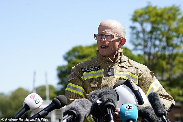 Oxfordshire Fire and Rescue Service's chief fire officer Rob MacDougall choked with emotion as he delivered a statement at a press conference in Bicester, Oxfordshire