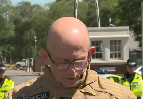 Firefighter giving a statement about a fatal fire at a former RAF base.