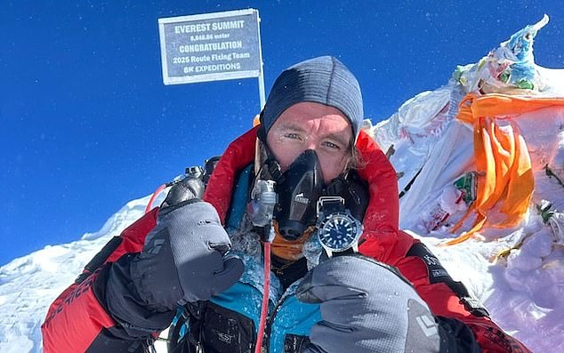 Mitch Hutchcraft, 31, has scaled Mount Everest in his bid to complete the world's longest triathlon after swimming the Channel and cycling from France to India