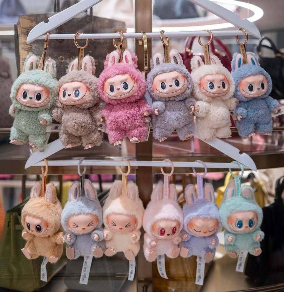 Row of Labubu bunny keychains.