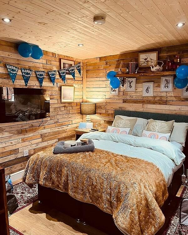 The luxurious accommodation, including a double bed, shower room, dressing gowns and patio with furniture was described as a 'beautiful hidden gem' by one guest