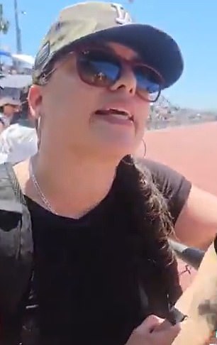 The mother of a trans high school athlete has been confronted by her fellow parents