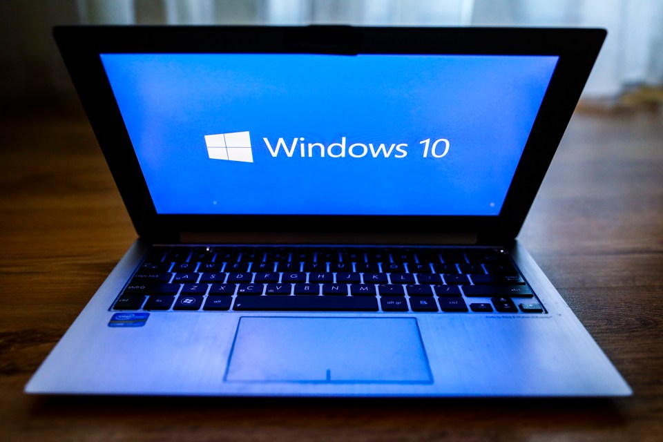 Laptop displaying the Windows 10 logo.