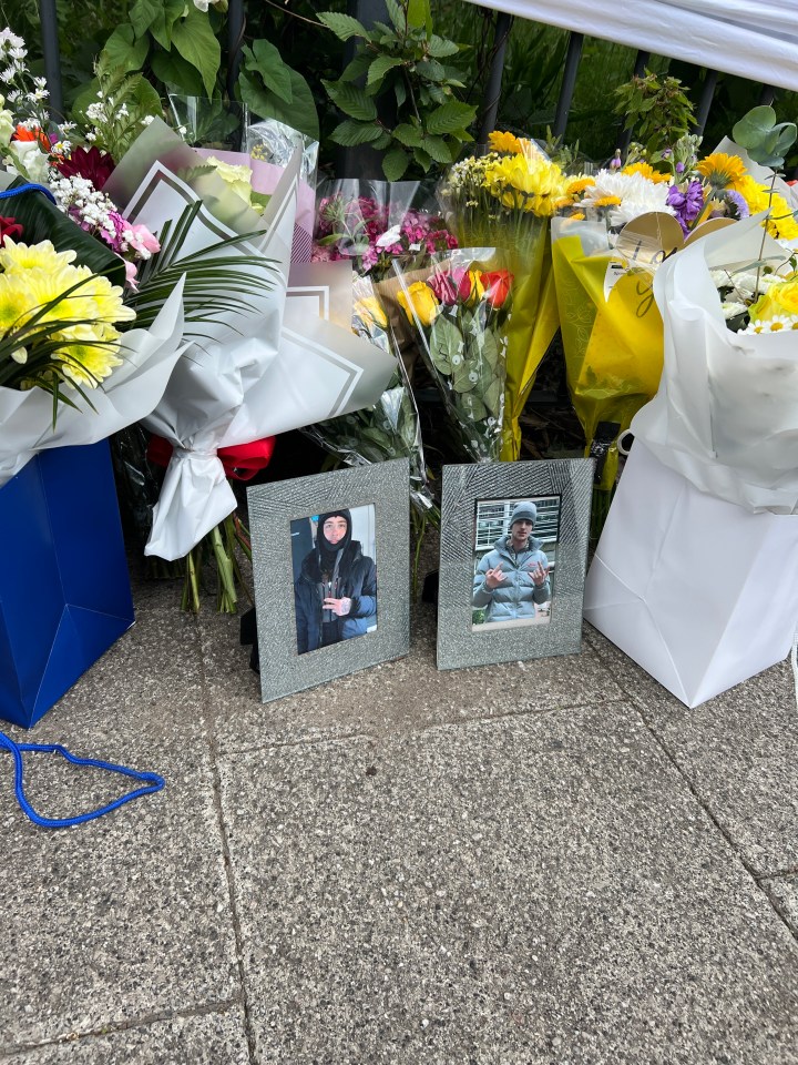 Floral tributes and photos of Kaine and Kailem at the scene of a fatal crash.
