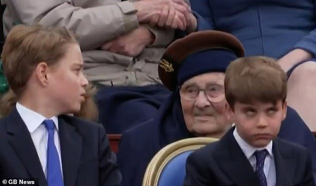 Prince Louis was hilariously caught rolling his eyes at his older brother Prince George yesterday as they joined members of the Royal Family to mark the 80th anniversary of VE Day in London