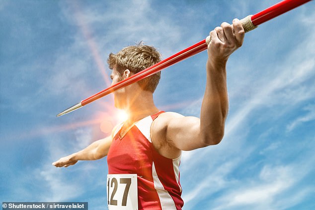 A 13-year-old girl was killed after being struck in the head by a spear during an athletics training session at school. Stock image shows a male javelin thrower