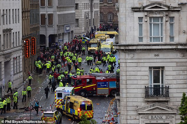 A car collided with a crowd of Liverpool fans at their Premier League trophy parade on Monday