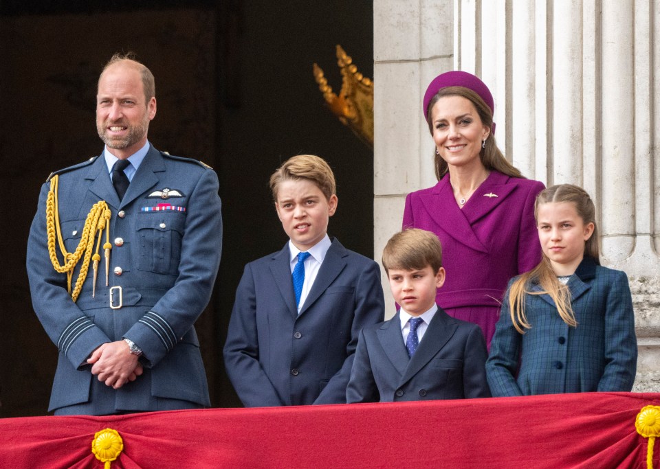 The Prince and Princess of Wales with their three children on the Buckingham Palace balcony.