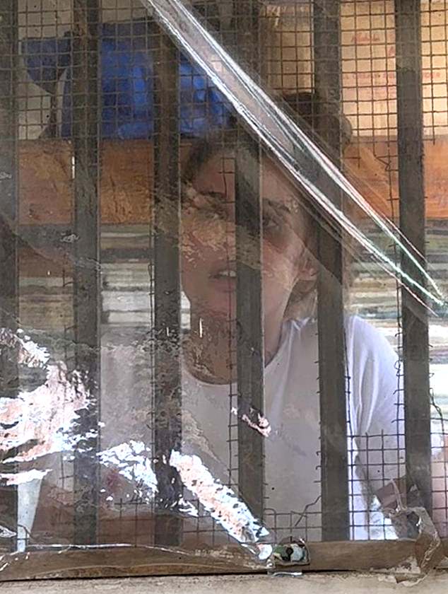 SriLankan Airlines Flight UL 405 had barely left the runway before the 21-year-old part-time beautician from Surrey slapped on a hydrating in-flight facial mask and stuck in her earphones. Pictured: Charlotte May Lee behind bars in Sri Lanka