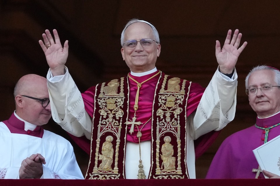 Pope Leo XIV appearing on the Vatican balcony.