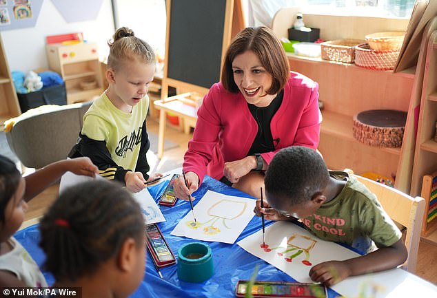 Education Secretary Bridget Phillipson taking part in an art activity with pupils during a visit to the school-based nursery at Ark Start Oval in East Croydon, South London, on July 10, 2024
